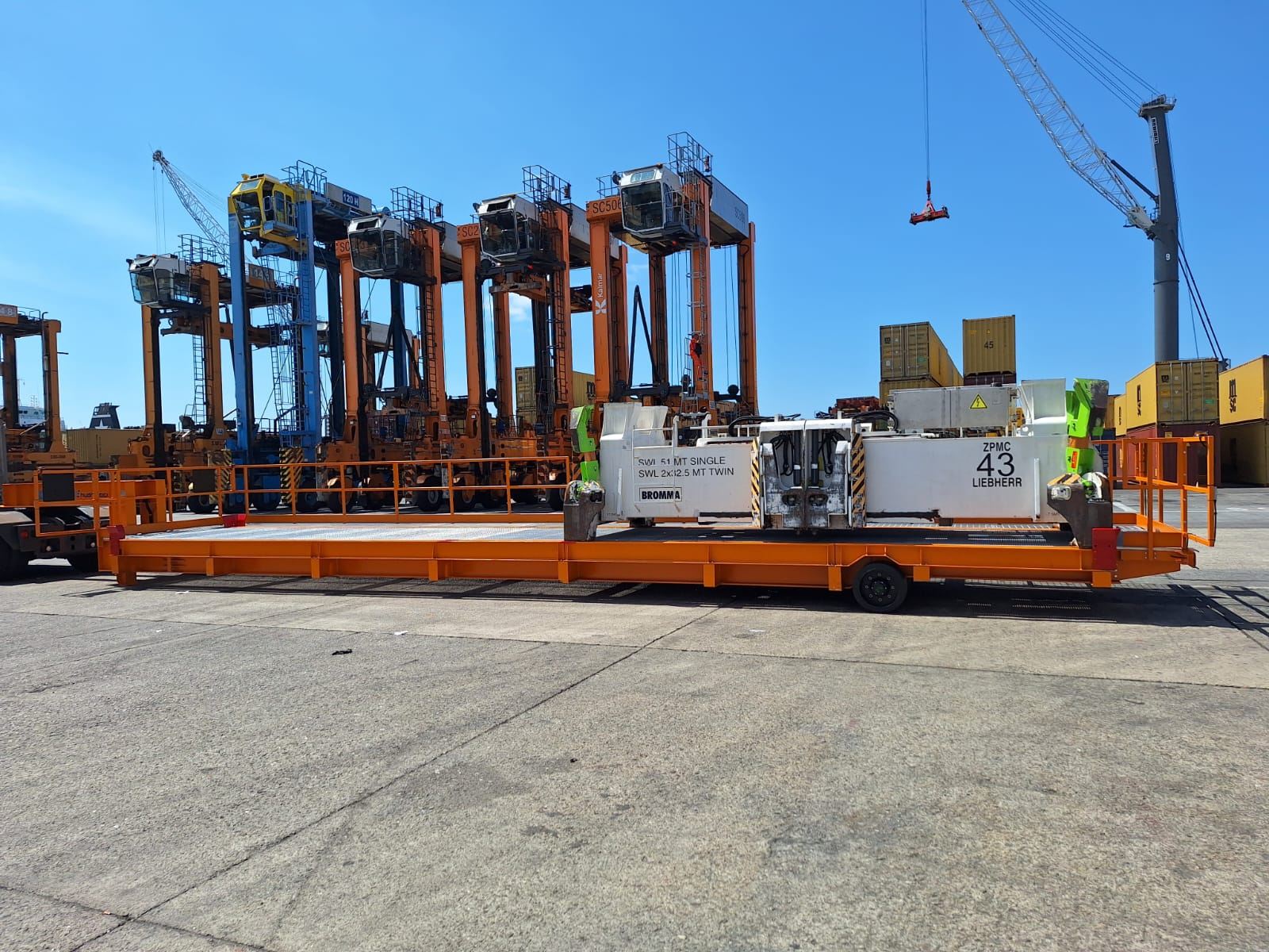 Spreader tow trailer at an Italian container port