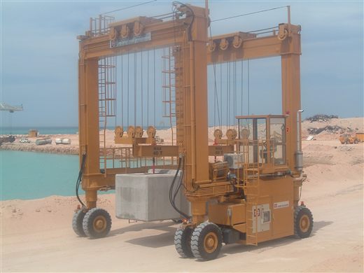MOBILIFT carrying a concrete block in a port (archive photo)